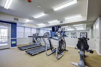 The gym at the whispering winds apartments in pearland, tx
